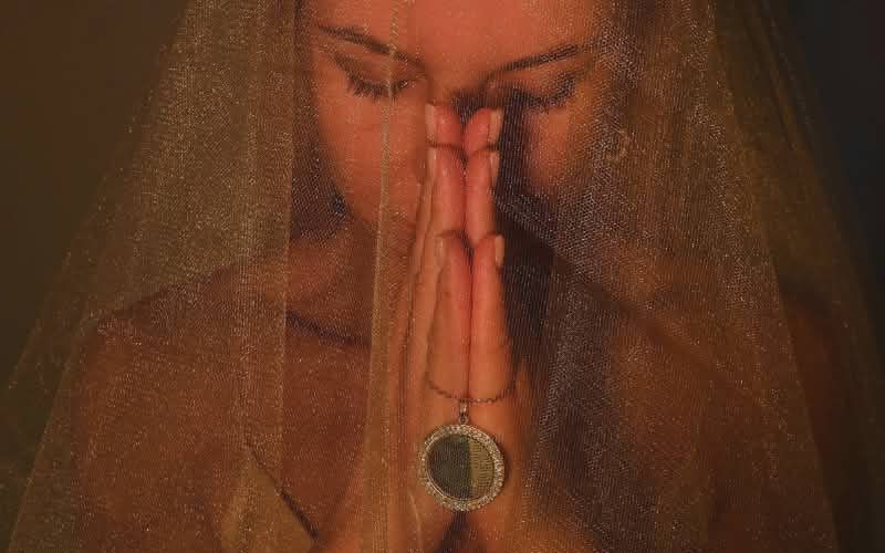 Woman in prayer and spiritual reflection